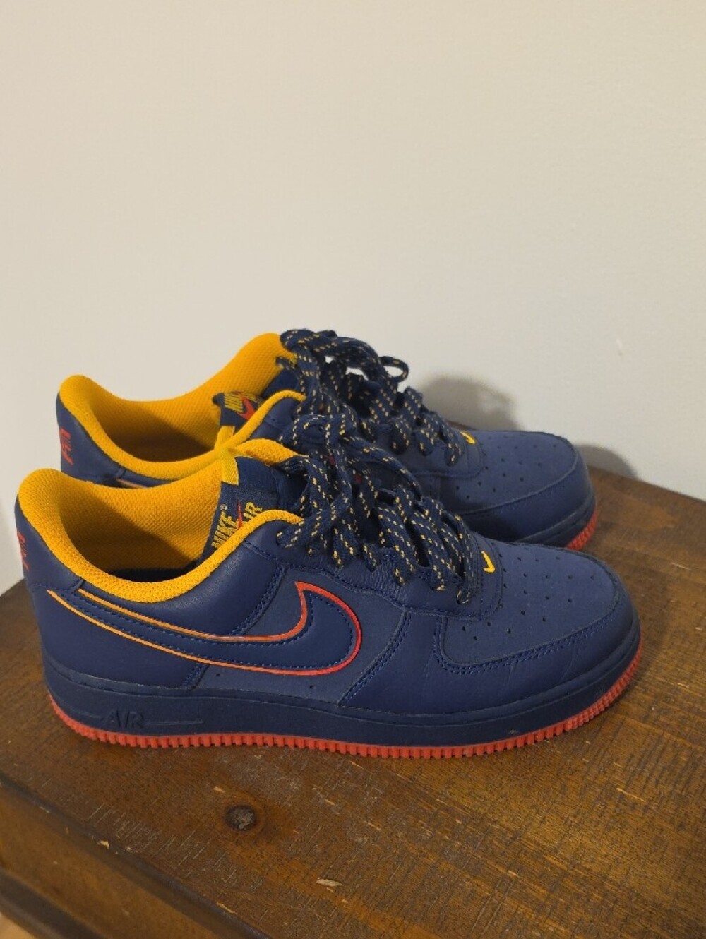 Nike Kids Navy Sneakers with Yellow Lining and Red Soles - Picture 2 of 5